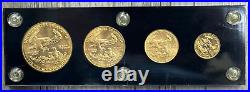 1986 AMERICAN GOLD EAGLE 1.85ozt 4 COIN TYPE SET IN CAPITOL PLASTIC DISPLAY CASE